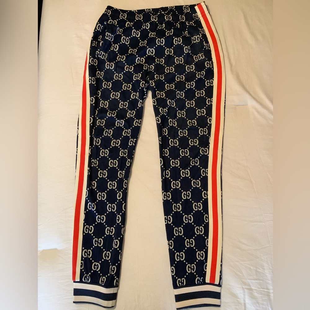 Gucci Navy GG Monogram Track Pants with red & white Stripes on the sides